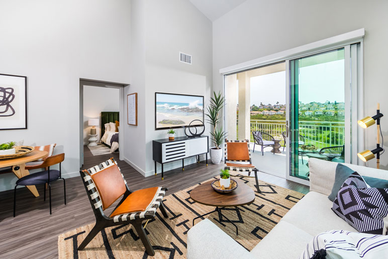 M Collection Living room with golf course view